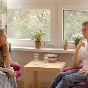 Three people in a mediation session for legal options regarding Co-Parenting With A Difficult Ex.